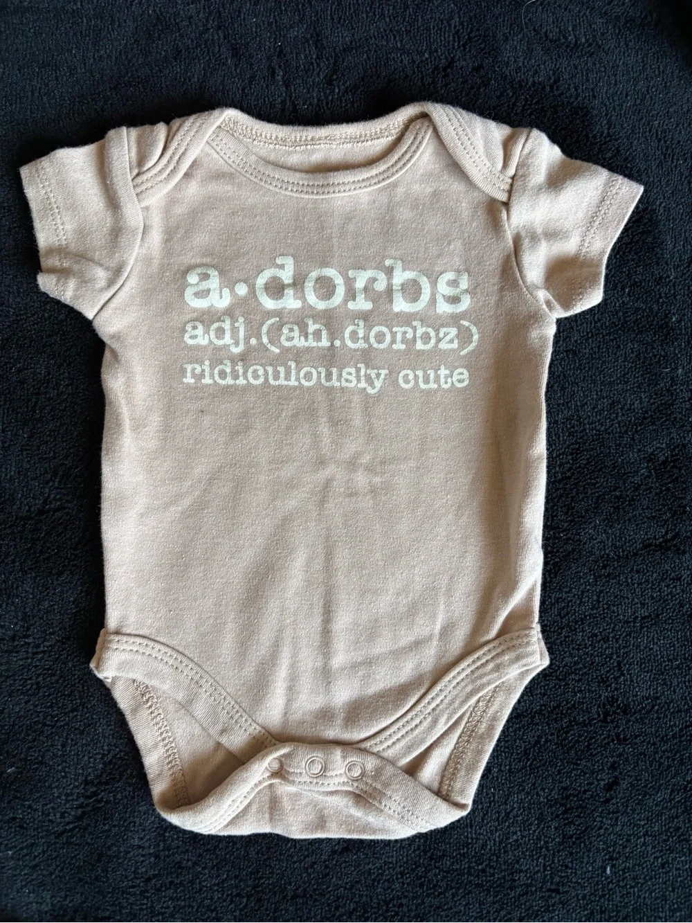 Ridiculously Cute 'a.dorbs' Baby One-Piece in Light Beige